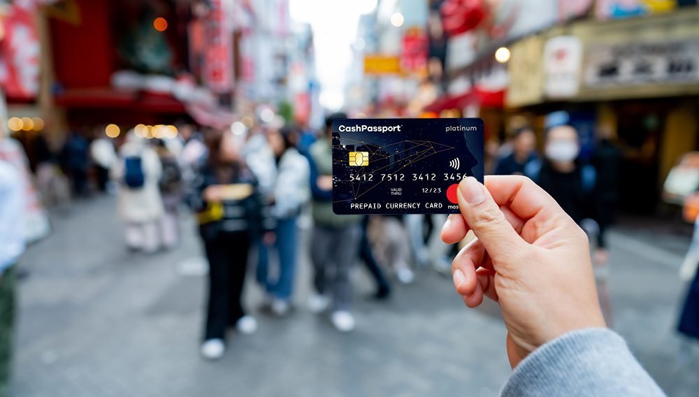 Holding a Cash Passport, traveller in Asia