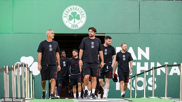 Russell Martin leads out his players and staff at the Olympic Stadium in Athens