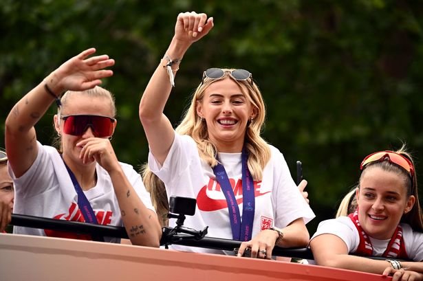 Chloe Kelly of England acknowledges the fans during the England Women's team victory parade