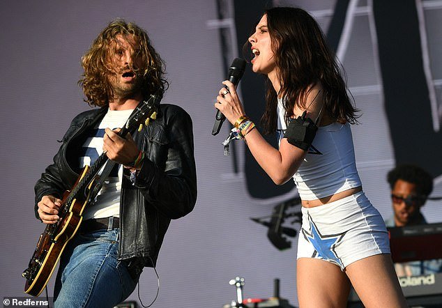 Change of tune: Wolf Alice, fronted by Ellie Rowsell (with guitarist Joff Oddie), have toned down their raw rock on latest album The Clearing, in favour of a softer Seventies sound