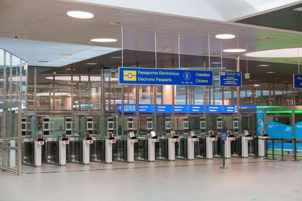 Electronic passport control gates at an airport.