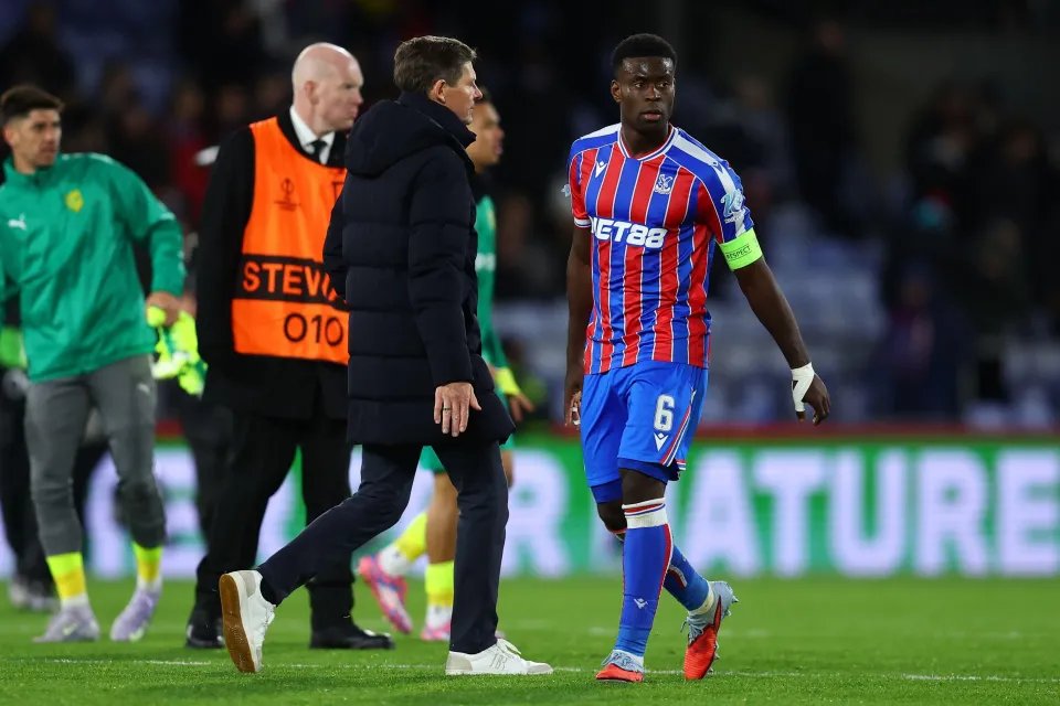 London, England, 23rd October 2025. Oliver Glasner, Manager of Crystal Palace and Marc Guehi¿of Crystal Palace walk past each other at the end of the Crystal Palace vs AEK Larnaca UEFA Conference League match at Selhurst Park, London. Picture credit