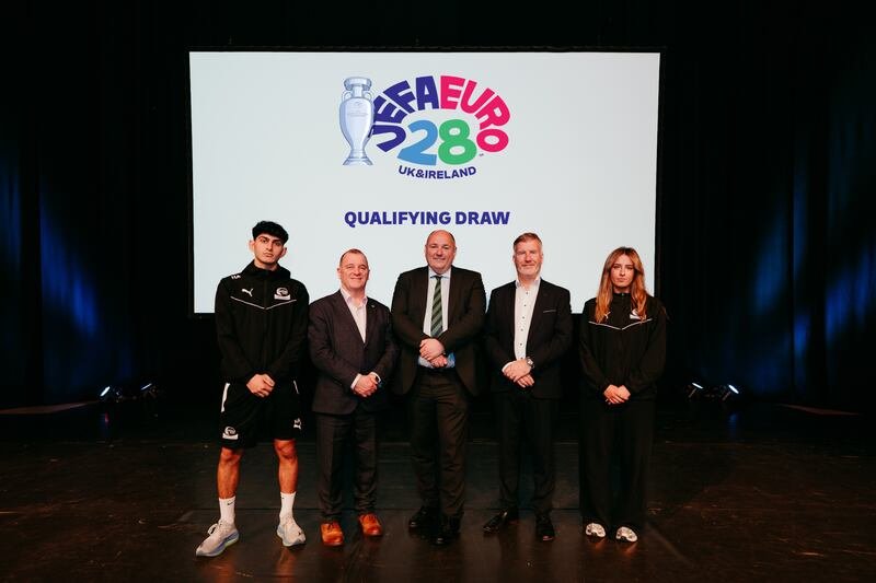 At the launch of Euro 2028, IFA chief executive Patrick Nelson, Rob McConnell, chief executive of ICC Belfast and IFA president Conrad Kirkwood, flanked by Hamdu Al Shbeeb and Poppy Cunningham, football scholars from Belfast Met