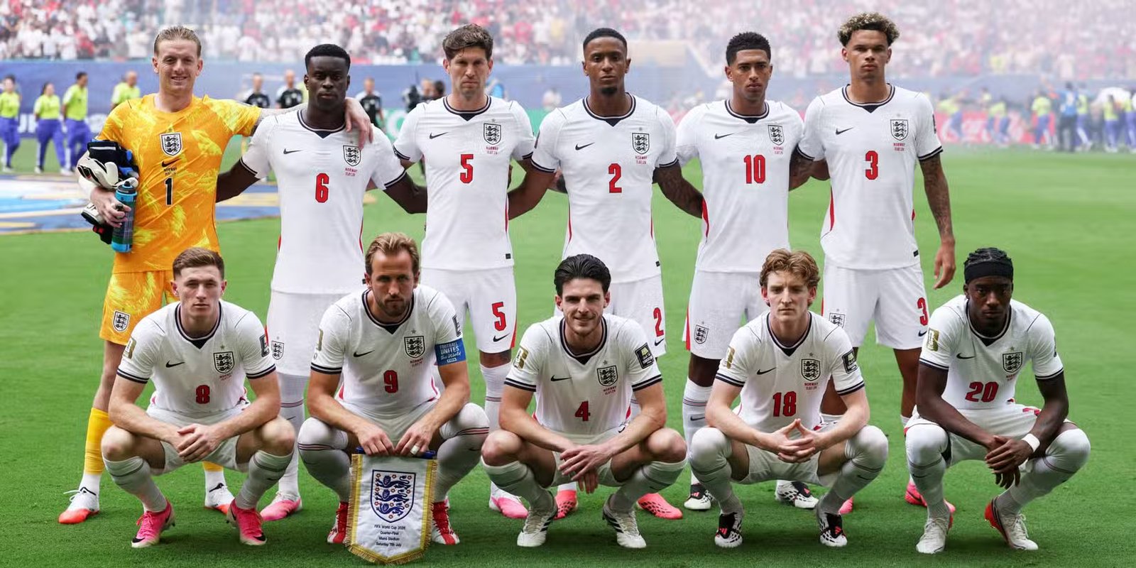 England players pose for a team group photo before the match