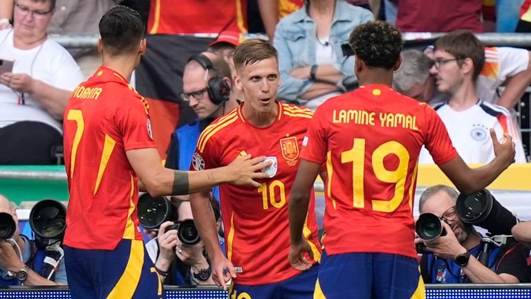 Spain's Dani Olmo celebrates after scoring the opener