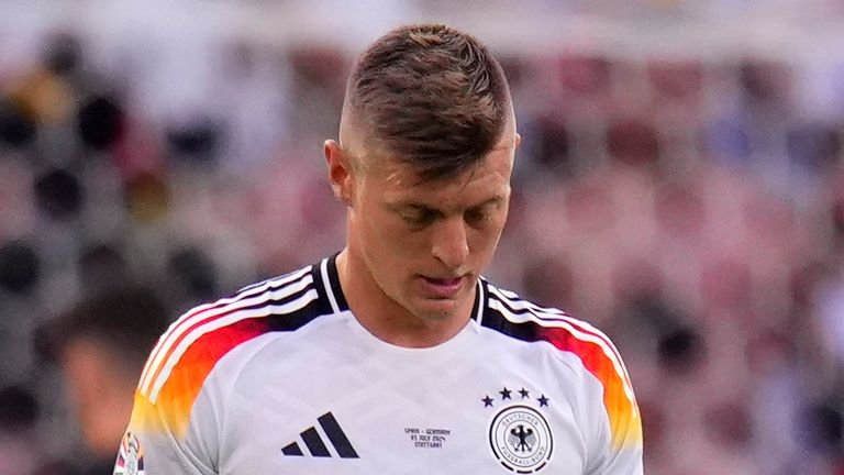 Germany's Toni Kroos walks off the pitch after his final game